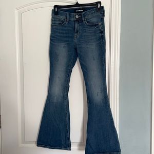 Express stretch Mid Rise Bell Flare jeans; Size 0 Short